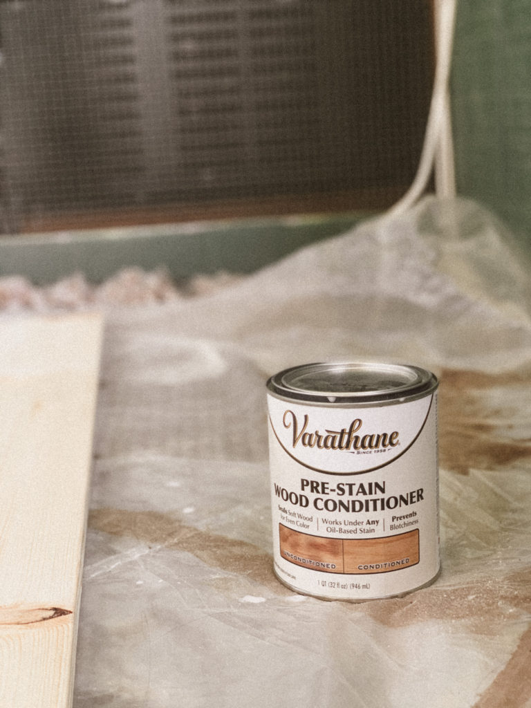 Close up photo of the can of Varathane Pre-Stain Wood Conditioner.