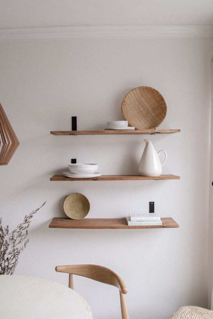 Baskets and books to style open shelves. 
